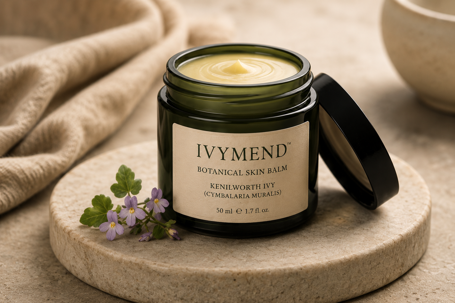 Open IvyMend botanical skin balm jar